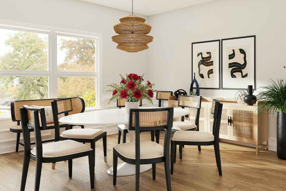 black matte details in dining room with wood accents and hardwood flooring